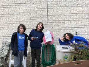 rain barrel with boys